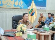 Sekdaprov Lampung Marindo Ikuti Peluncuran Buku Panduan dan Bahan Ajar Pendidikan Antikorupsi